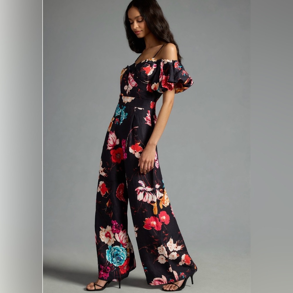 Floral jumpsuit. Linen material. Super flattering and comfy. NWT